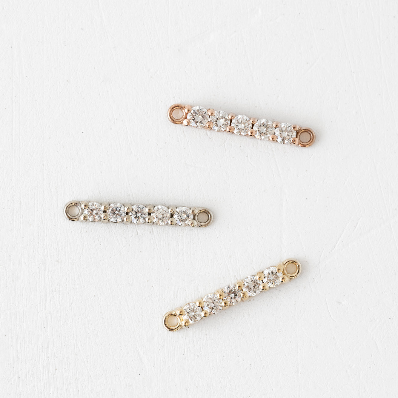 Three rose, gold and white gold bar pins with Forever Linked Linked Bar Lab Diamond Charms.