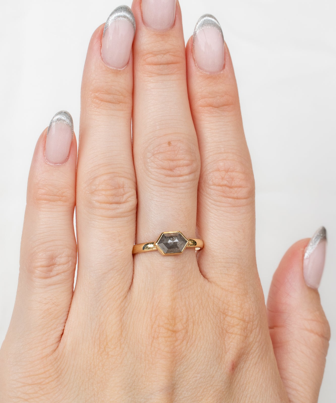 Model showcasing Bellatrix Ring with diamond
