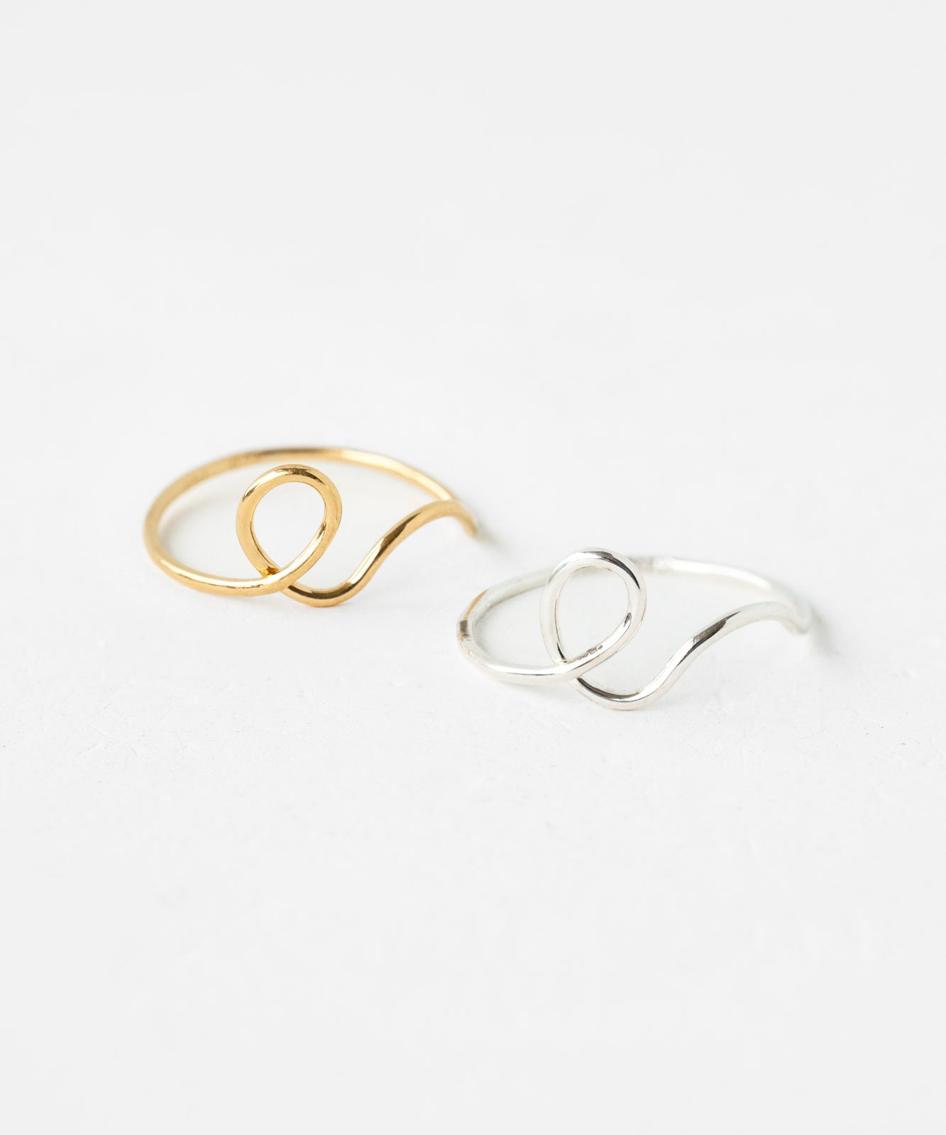 Elegant calligraphy ring on neutral background
