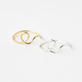 Elegant calligraphy ring on neutral background