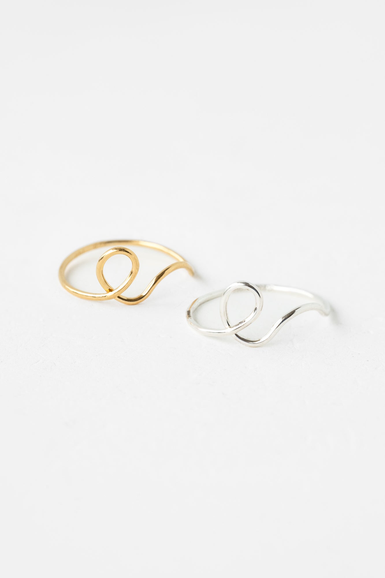 Elegant calligraphy ring on neutral background
