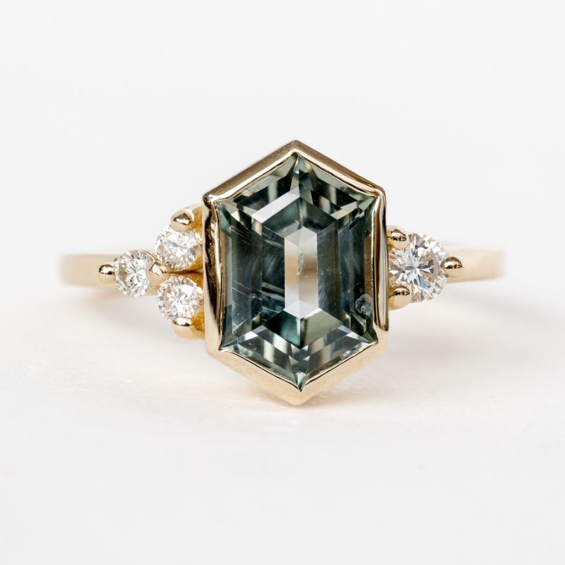 An octagonal green blue stone and diamond ring, custom jewelry.