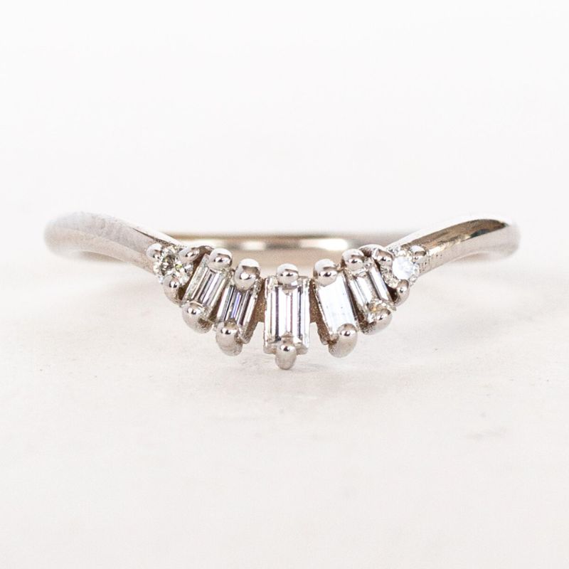 A custom diamond band featuring row of stones