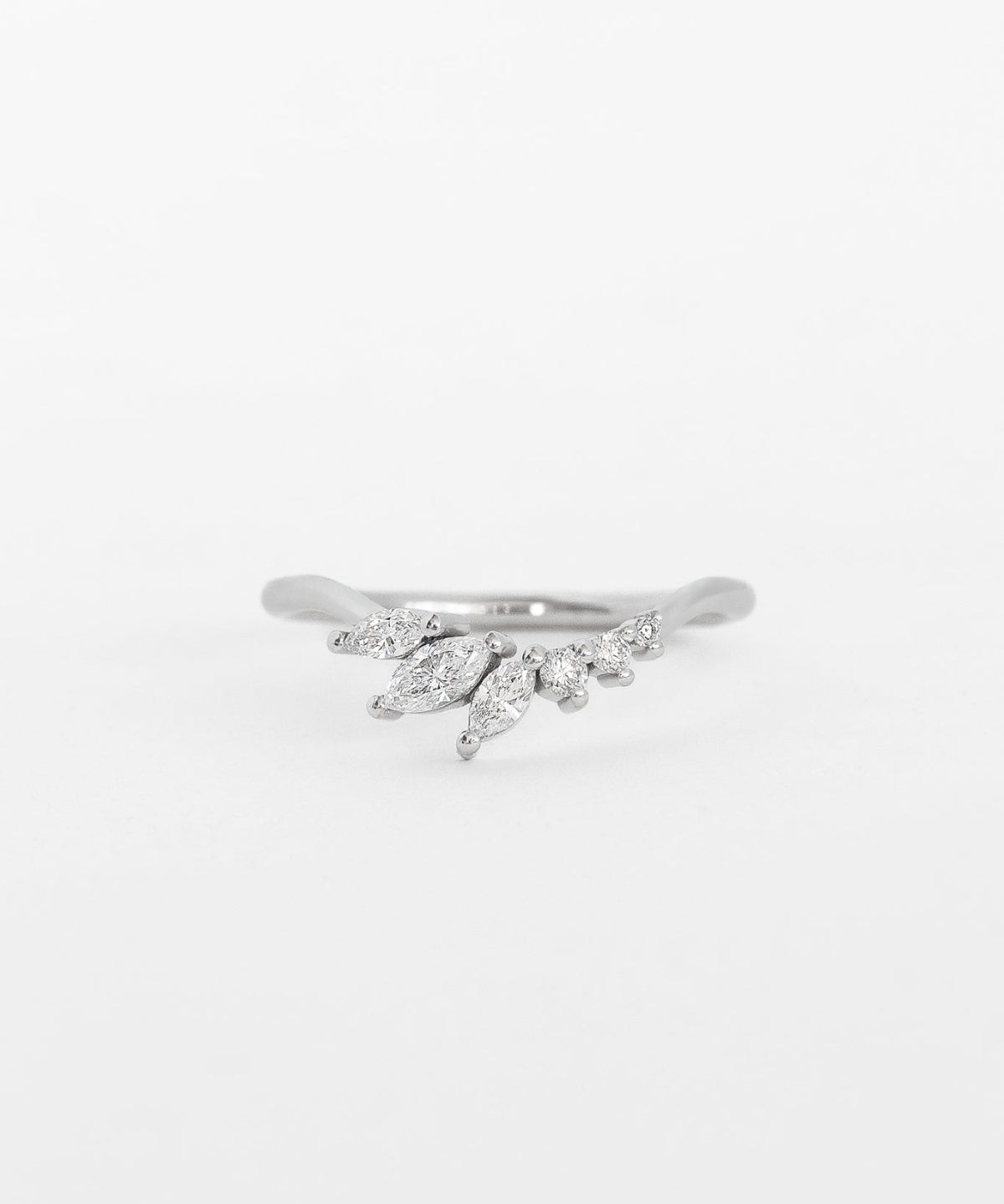Close-up of silver floral engraved ring