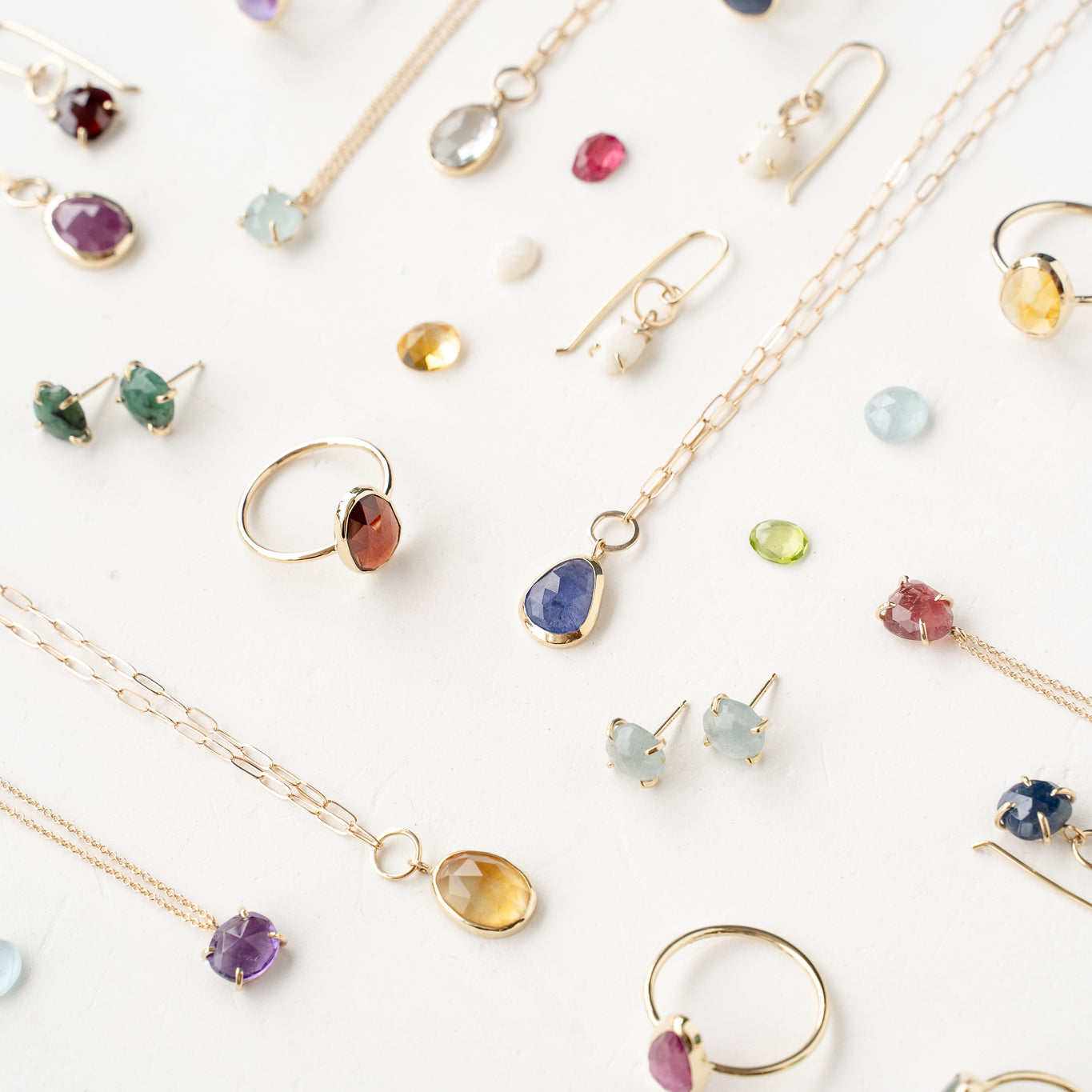 Flat lay of EBJ Elements Collection pieces