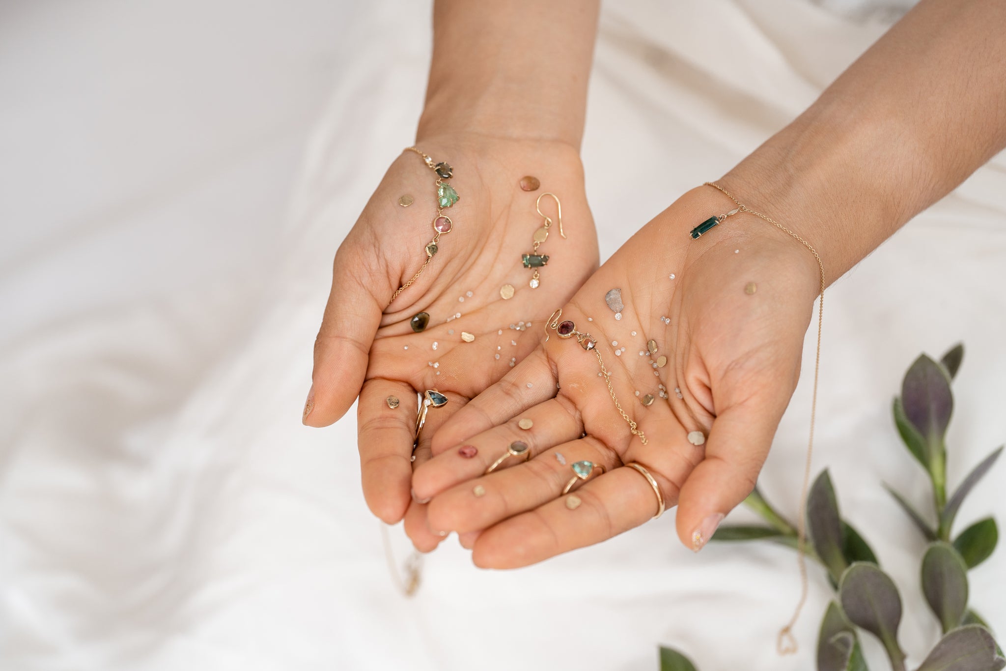 Hands showcasing El Dorado collection rings