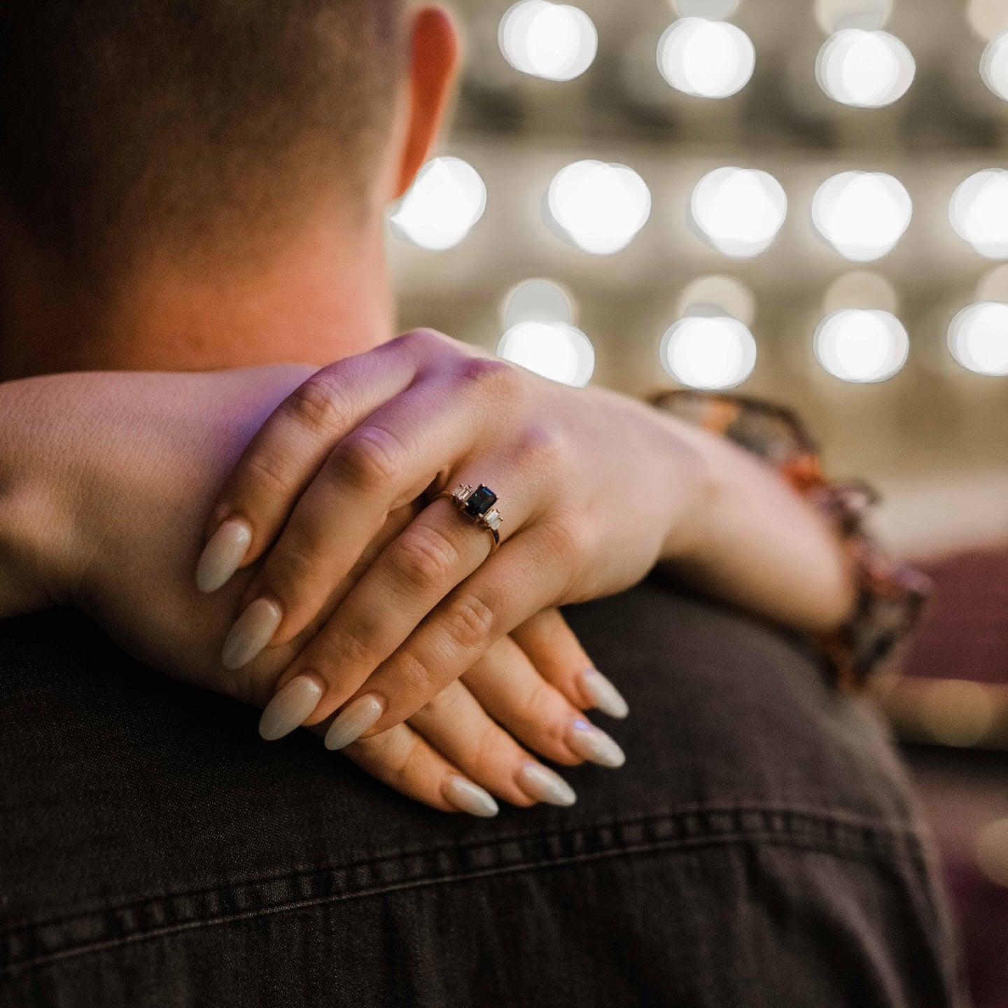 Kristen and Adam wearing EBJ wedding bands