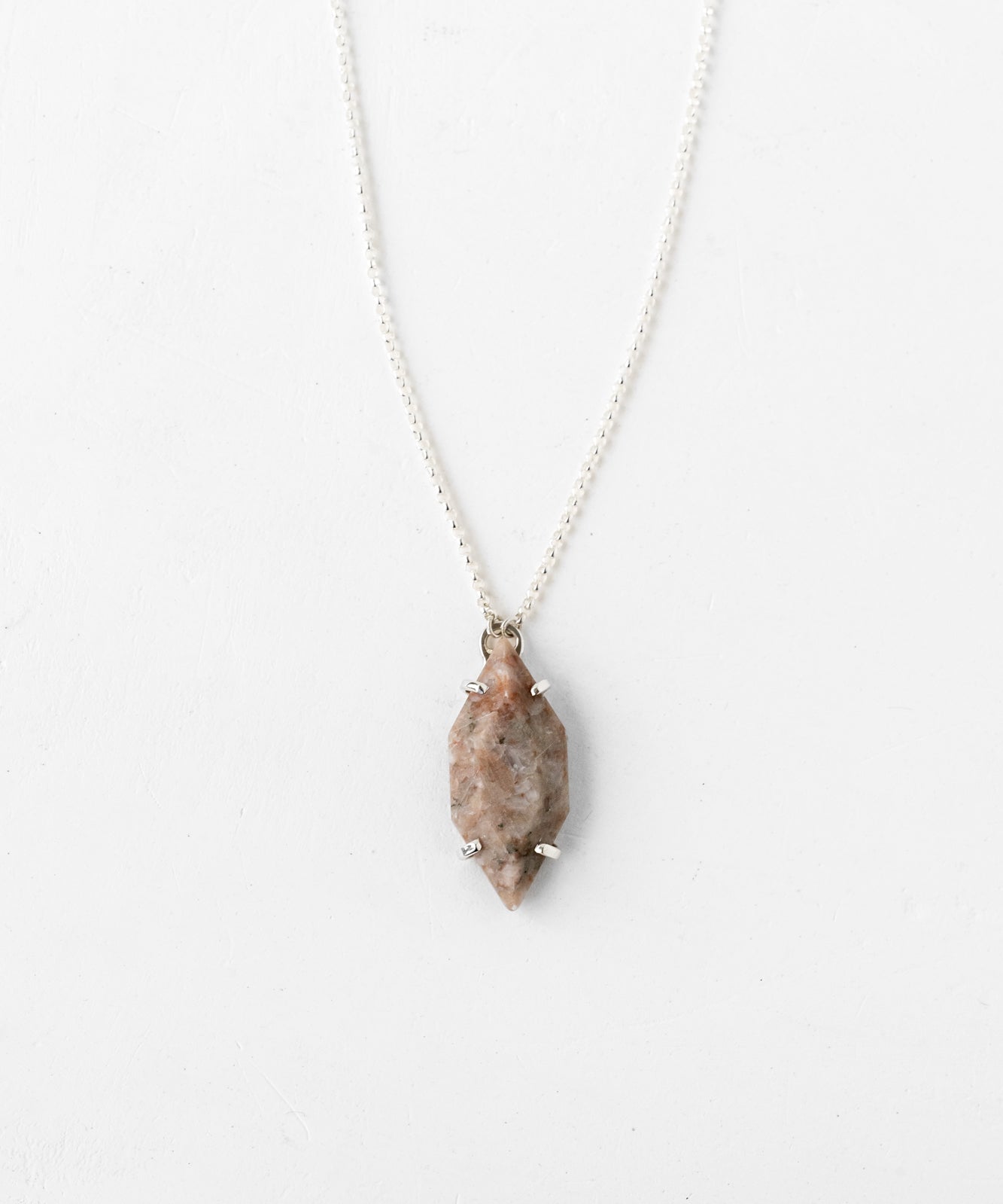 Minimalist solid silver vertical necklace close-up