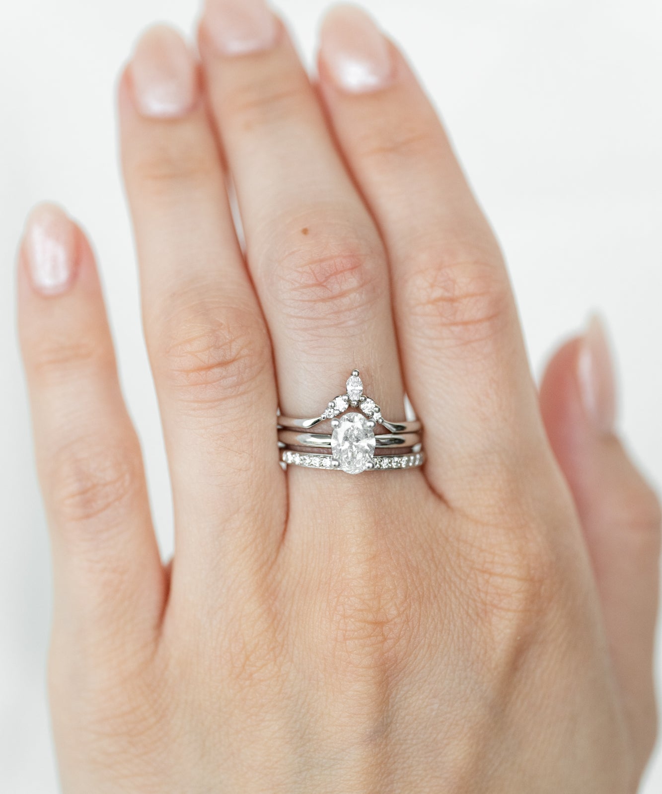 Elegant oval rings with sparkling gemstones