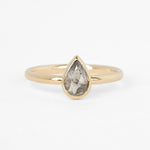 Elegant Bellatrix ring with salt-and-pepper diamond