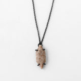 Oxidized vertical necklace on delicate chain