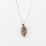 Minimalist solid silver vertical necklace close-up