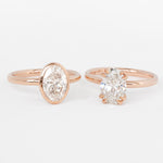 Oval Aura Nouveau rings with intricate designs