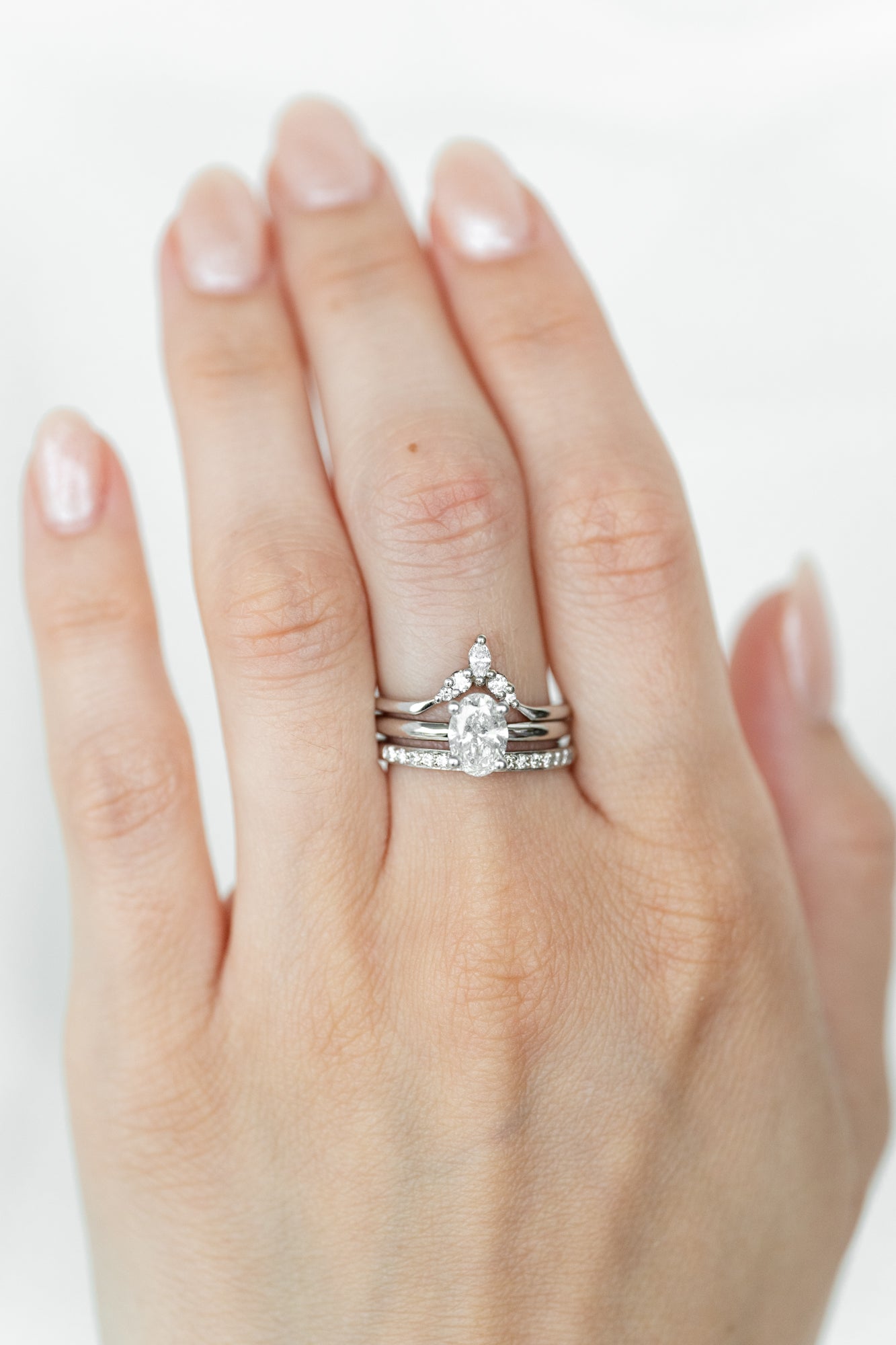 Elegant oval rings with sparkling gemstones