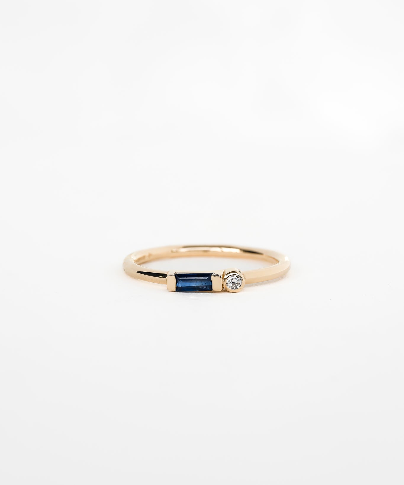 Close-up of elegant gold gemstone ring