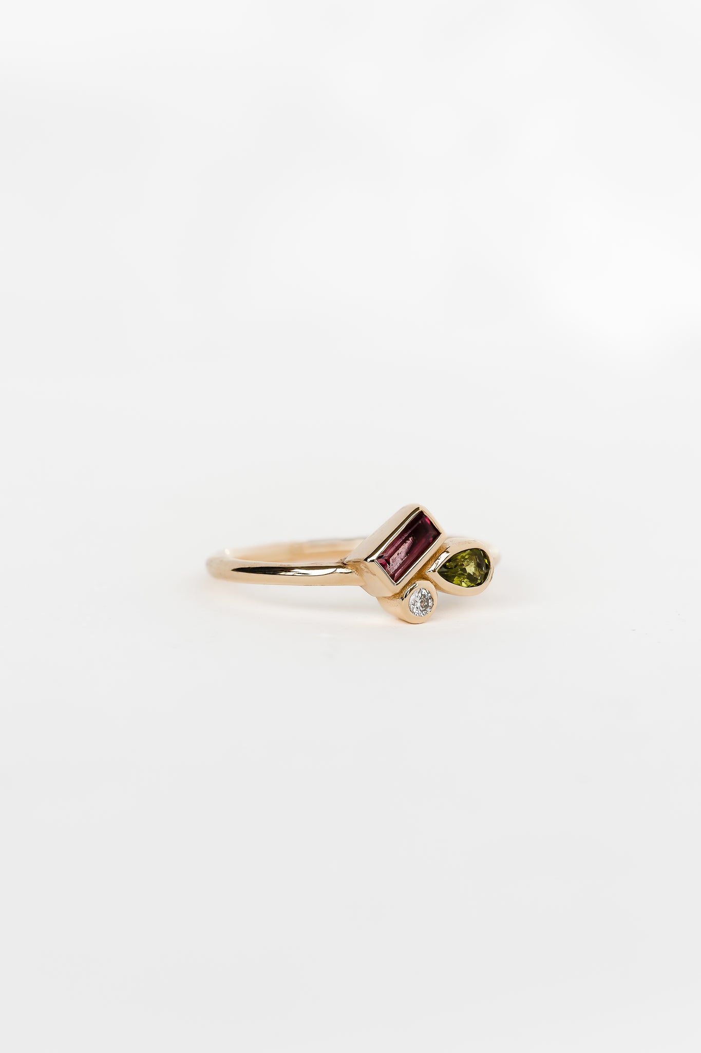 Close-up of intricately designed Gemini ring