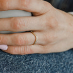Model showcasing delicate gold diamond contour ring