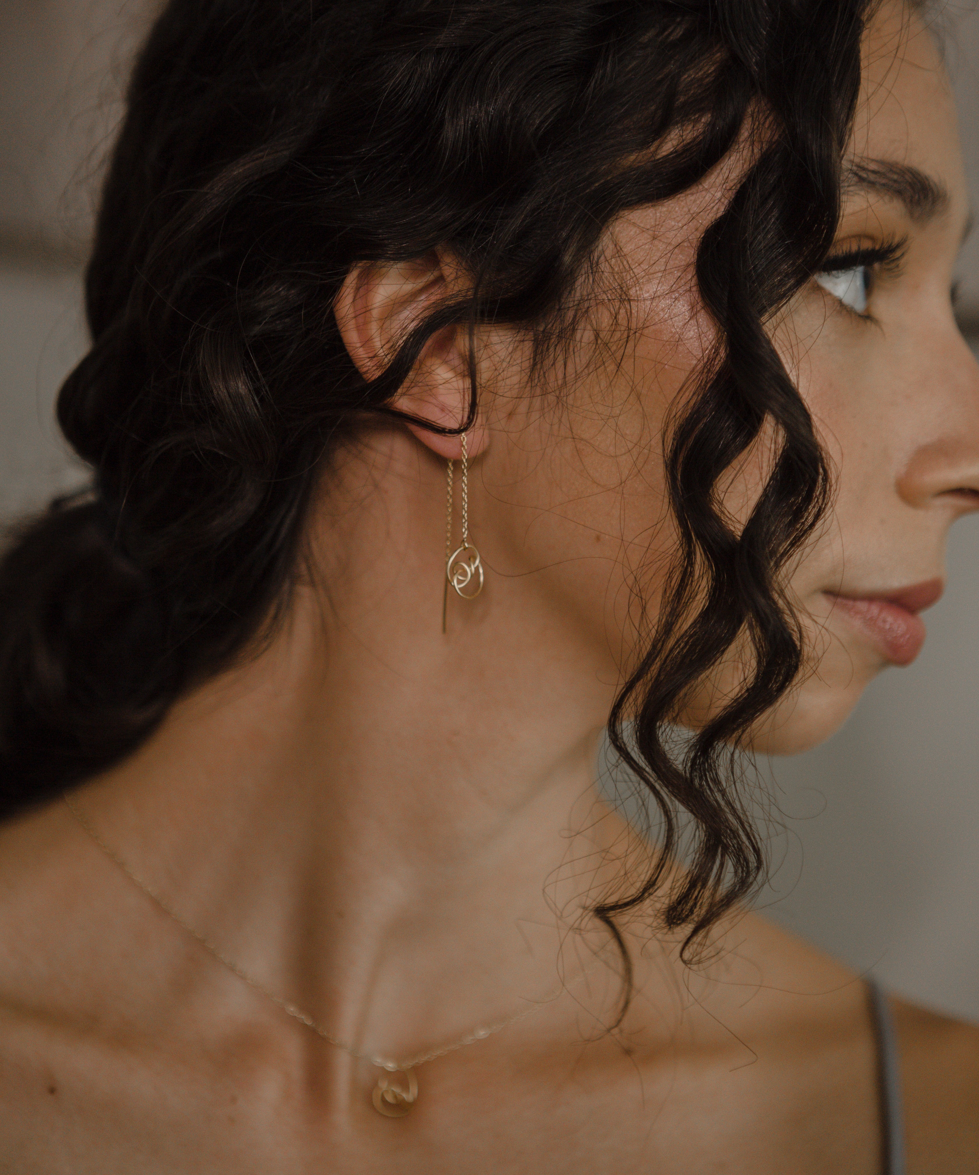 Elegant gold threader earrings with gemstones